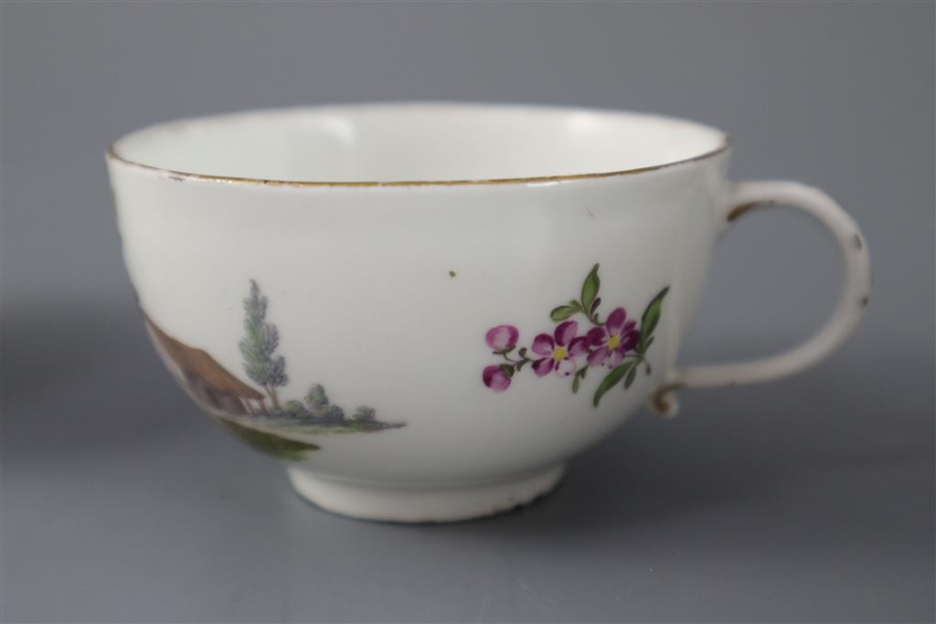 A Meissen coffee cup and saucer, c.1750, and a Meissen prunus sprig tea bowl and saucer, c.1730-40, (4)